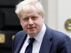 Britain's Foreign Secretary Boris Johnson leaves after attending the weekly cabinet meeting at number 10 Downing Street, in central London on Tuesday, Jan. 23, 2018.