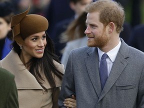 This Monday, Dec. 25, 2017 file photo shows Britain's Prince Harry and his fiancee Meghan Markle as they arrive to attend the traditional Christmas Day service, at St. Mary Magdalene Church in Sandringham, England.