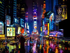 Times Square in New York on a rainy night. (schalkm/Getty Images)