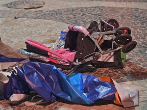 A discarded carriage is seen at the scene of a car crash at Copacabana beach in Rio de Janeiro on Jan.18, 2018.  (CARL DE SOUZA/AFP/Getty Images)
