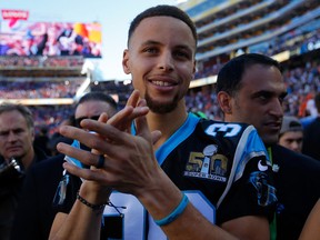Stephen Curry of the Golden State Warriors stands on the field prior to Super Bowl 50 between the Denver Broncos and the Carolina Panthers at Levi's Stadium on Feb. 7, 2016