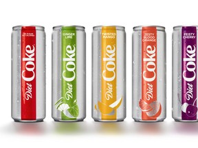 This photo provided by The Coca-Cola Co. shows examples of Diet Coke's rebranding effort. The Coca-Cola Co. says it is adding a slimmer 12-ounce Diet Coke can, refreshing the logo and offering the 35-year-old drink in four new flavours, including mango and ginger lime. (Courtesy of The Coca-Cola Co. via AP)