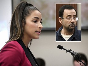 Olympic gold medalist Aly Raisman gives her victim impact statement, Friday, Jan. 19, 2018, in Lansing, Mich., during the fourth day of sentencing for former sports doctor Larry Nassar, who pled guilty to multiple counts of sexual assault.