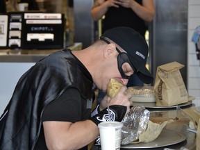 Batman fan Bruce Wayne (yes, that's his real name) set a record by eating at his local Chipotle for 426 consecutive days. (Twitter/ChipotleTweets)