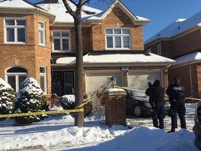 Halton Regional Police at a home in Oakville after two bodies were found on Wednesday, Jan. 17, 2018. (Joe Warmington/Toronto Sun)