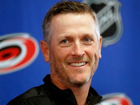 New Carolina Hurricanes majority owner Thomas Dundon smiles during an introductory press conference at PNC Arena in Raleigh, N.C., on Jan. 12, 2018