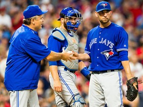 Jays manager John Gibbons removes starting pitcher Marco Estrada from the game against the Cleveland Indians at Progressive Field on July 21, 2017 in Cleveland, Ohio. (Jason Miller/Getty Images)