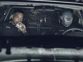 FILE - This undated image released by Netflix shows Will Smith, left, and Joel Edgerton in a scene from, "Bright." Despite scathing reviews from critics, Netflix has greenlit a sequel to "Bright," with star Smith and director David Ayer expected to return. The streaming service announced the plans Wednesday, Jan. 3, 2018, just two weeks after the fantasy police drama debuted.