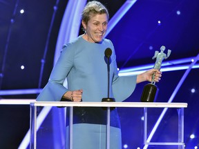 Frances McDormand accepts the award for outstanding performance by a female actor in a leading role for "Three Billboards Outside Ebbing, Missouri" at the 24th annual Screen Actors Guild Awards at the Shrine Auditorium & Expo Hall in Los Angeles on Sunday, Jan. 21, 2018.