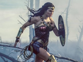 This file image released by Warner Bros. Entertainment shows Gal Gadot charging through No Man's Land during a WWI battle scene from "Wonder Woman."