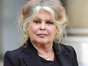 A picture taken on September 27, 2007 shows French film legend and animal rights activist Brigitte Bardot posing at the Elysee palace in Paris after a meeting with French President Nicolas Sarkozy. Bardot, France's 1960s screen icon, received a 15,000-euro (23,000 dollar) fine on June 3, 2008 for inciting hatred against Muslims. AFP PHOTO ERIC FEFERBERG (Photo credit should read ERIC FEFERBERG/AFP/Getty Images)
