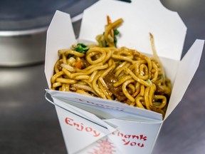 In this stock photo, lo mein sits in a take out box at a Chinese restaurant.