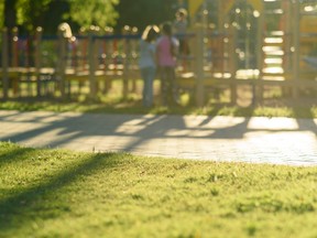 In this stock photo, children play in a playground.