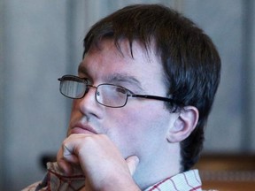 Graig Burrier sits in the courtroom during a hearing Wednesday, Nov. 8, 2017 in the Summit County Common Please Court in Akron, Ohio. (Karen Schiely, Akron Beacon Journal via AP)