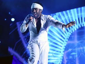 FILE - In this June 3, 2017, file photo, Donald Glover, who goes by the stage name Childish Gambino, performs at the Governors Ball Music Festival in New York. Childish Gambino, Lady Gaga, Little Big Town and Pink will perform at the 60th Grammy Awards, which will also feature Broadway musical tributes by Patti LuPone and Ben Platt in honor of the show's return to New York City. The Recording Academy announced Thursday, Jan. 4, 2018, the first round of performers for the Jan. 28 awards show, held live from Madison Square Garden.