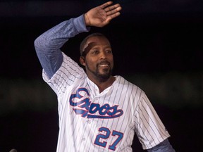 Former Montreal Expos Vladimir Guerrero waves to the crowd during a pre-game ceremony as the Toronto Blue Jays face the Cincinnati Reds in MLB exhibition play on April 3, 2015