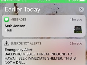 This smartphone screen capture shows a false incoming ballistic missile emergency alert sent from the Hawaii Emergency Management Agency system on Saturday, Jan. 13, 2018. (AP Photo/Marco Garcia)