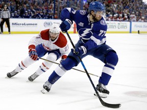 Tampa Bay Lightning defenceman Victor Hedman clears the puck away from Montreal Canadiens left winger Alex Galchenyuk on Dec. 28, 2017
