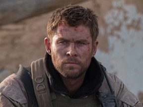 Chris Hemsworth leads a U.S. Special Forces team in 12 Strong. (Warner Bros.)