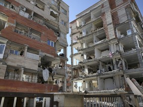 Buildings are damaged by an earthquake in a compound in Sarpol-e-Zahab in western Iran, Nov. 14, 2017. One report predicts Montrealers could suffer $45 billion in economic losses if the city were to experience an earthquake measuring 5.8 on the Richter scale.