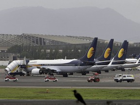 In this Sept. 9, 2009, file photo, Jet Airways planes are parked on the tarmac at the domestic airport terminal in Mumbai, India.
