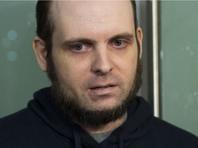 Joshua Boyle speaks to the media after arriving at Pearson International Airport in Toronto on Oct. 13, 2017.