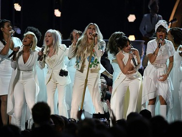 Kesha (C) performs with (from L to R) Bebe Rexha, Cindy Lauper, Camila Cabello and Andra Day during the 60th Annual Grammy Awards show on Jan. 28, 2018, in New York. (TIMOTHY A. CLARY/AFP/Getty Images)