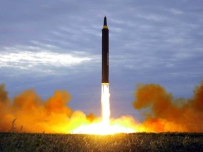 In this Aug. 29, 2017 file photo distributed on Aug. 30, 2017, by the North Korean government shows what was said to be the test launch of a Hwasong-12 intermediate range missile in Pyongyang, North Korea.