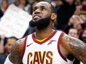 LeBron James of the Cleveland Cavaliers looks up after scoring his seventh point of the game against the San Antonio Spurs putting in the 30,000-point club on Jan. 23, 2018
