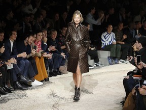 Model Kate Moss wears a creation for Louis Vuitton Fall-Winter 2018/2019 fashion collection presented in Paris, Thursday, Jan.18, 2018.
