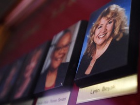 A picture of Senator Lynn Beyak accompanies other Senators' official portraits on a display outside the Senate on Parliament Hill in Ottawa on Sept. 21, 2017.
