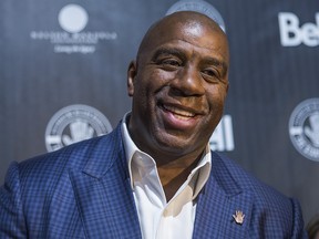 Former NBA star Magic Johnson on the red carpet at the Air Canada centre during an event honouring the late Nelson Mandela in Toronto on Friday December 5, 2014. (Ernest Doroszuk/Postmedia Network)