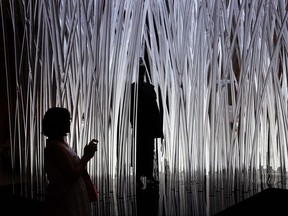 People walk through an exhibition at the Metropolitan Museum of Art (the Met) on July 30, 2015 in New York City.  (Spencer Platt/Getty Images)