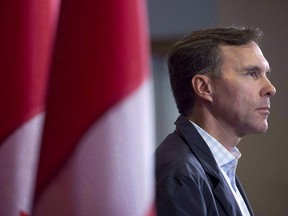Finance Minister Bill Morneau takes questions as the Liberal cabinet meets in St. John's, N.L. on Tuesday, Sept. 12, 2017.