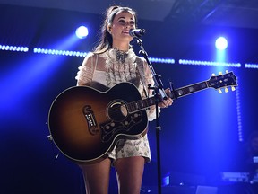 In this photo provided by UMG, Kacey Musgraves performs at Sir Lucian Grainge's 2018 Artist Showcase presented by American Airlines and Citi on Saturday, Jan. 27, 2018 in New York. (Jordan Strauss/Invision for UMG/AP Images)