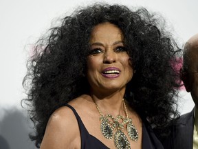 FILE - In this Nov. 19, 2017 file photo, Diana Ross, lifetime achievement award recipient, poses in the press room at the American Music Awards in Los Angeles. Ross, along with Bob Marley, Chuck Berry, the Beach Boys and Journey, are part of a group of iconic musicians who have never won a Grammy. In 2012, Ross did win the Lifetime Achievement Award, a noncompetitive honor, from The Recoding Academy.