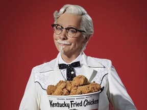 This photo provided by KFC shows singer Reba McEntire as KFC's Colonel Sanders. A rotating cast of famous names have portrayed the Colonel since 2015, but McEntire is the first female celebrity to do it, and the first musician. (Courtesy of KFC via AP) ORG XMIT: NYBZ645