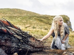 In this image released by HBO, Emilia Clarke appears in a scene from "Game of Thrones. The final season of "Game of Thrones" is at least a year away, but newcomers to the series can start catching up on the epic drama with CraveTV. The first three seasons of the show -- based on the books of George R. R. Martin -- hit the streaming service on Feb. 16 while the rest of the episodes will be rolled out later this year. CraveTV will also start streaming all six seasons of HBO's "Girls" on Feb. 9.