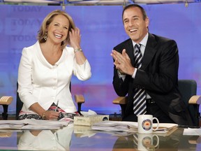 In this May 31, 2006 file photo, Katie Couric and Matt Lauer, co-hosts of the NBC Today program, open her farewell broadcast in New York.