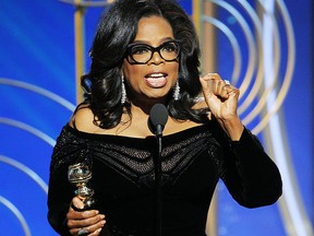 This image released by NBC shows Oprah Winfrey accepting the Cecil B. DeMille Award at the 75th Annual Golden Globe Awards in Beverly Hills, Calif., on Sunday, Jan. 7, 2018. (Paul Drinkwater/NBC via AP)