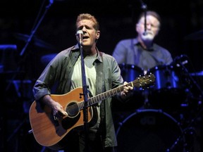 Glenn Frey, left, and Don Henley, right, perform with the rest of the Eagles at the Canadian Tire Centre in Ottawa July 15, 2013.