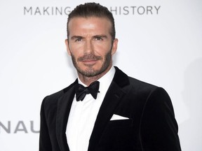FILE - In this May 25, 2017 file photo, soccer legend David Beckham poses for photographers upon arrival at the amfAR charity gala during the Cannes 70th international film festival, Cap d'Antibes, southern France. Beckham, who is married to fashion mogul Victoria Beckham, will launch 21 men's grooming products under the name House 99 on Feb. 1 in the United Kingdom, exclusively at Harvey Nichols stores.