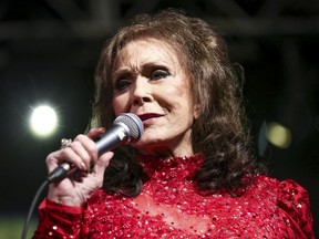 FILE - In this March 17, 2016, file photo, Loretta Lynn performs at the BBC Music Showcase at Stubb's during South By Southwest in Austin, Texas. Lynn, 85, has a fractured hip after a fall at her home in Tennessee. A statement on her website posted Monday said "she is doing well and thanks all her fans for their thoughts and prayers."