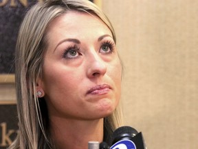 Kim Pack, daughter of murder victim April Kauffman, talks to the media at her attorney's office in Egg Harbor Township, N.J.