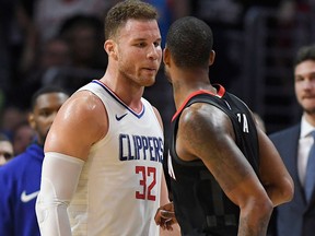 Los Angeles Clippers forward Blake Griffin, left, and Houston Rockets forward Trevor Ariza have words before both of them were ejected in the closing seconds of an NBA game on Jan. 15, 2018