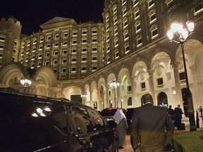 FILE - In this Jan. 23, 2016 file photo, the motorcade carrying then U.S. Secretary of State John Kerry arrives at the Ritz Carlton Hotel in Riyadh, Saudi Arabia. The Ritz Carlton in Saudi Arabia's capital may be reopening its doors in times for Valentine's Day 2018 after serving as a prison for the country's elite caught up in what the government has described as a crackdown on corruption. The hotel's website on Monday, Jan 15, 2018 showed bookings available beginning from Feb. 14. (AP Photo/Jacquelyn Martin, Pool, File) ORG XMIT: CAITH101