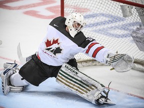 Canada's goaltender Ben Scrivens allows a goal during the Channel One Cup against Moscow on December 16, 2017.