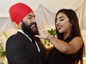 NDP Leader Jagmeet Singh proposes to Gurkiran Kaur at an engagement party in Toronto, Tuesday January 16, 2018.