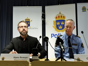 Prosecutor Hans Ihrman, left, and Christer Nilsson, head of the police investigation unit, attend a press conference in Stockholm, Tuesday Jan. 30, 2018. (Henrik Montgomery/TT via AP)