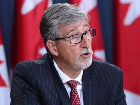 Privacy Commissioner Daniel Therrien holds a news conference at the National Press Theatre in Ottawa on Thursday, Sept. 21, 2017, to discuss his annual report. THE CANADIAN PRESS/Sean Kilpatrick